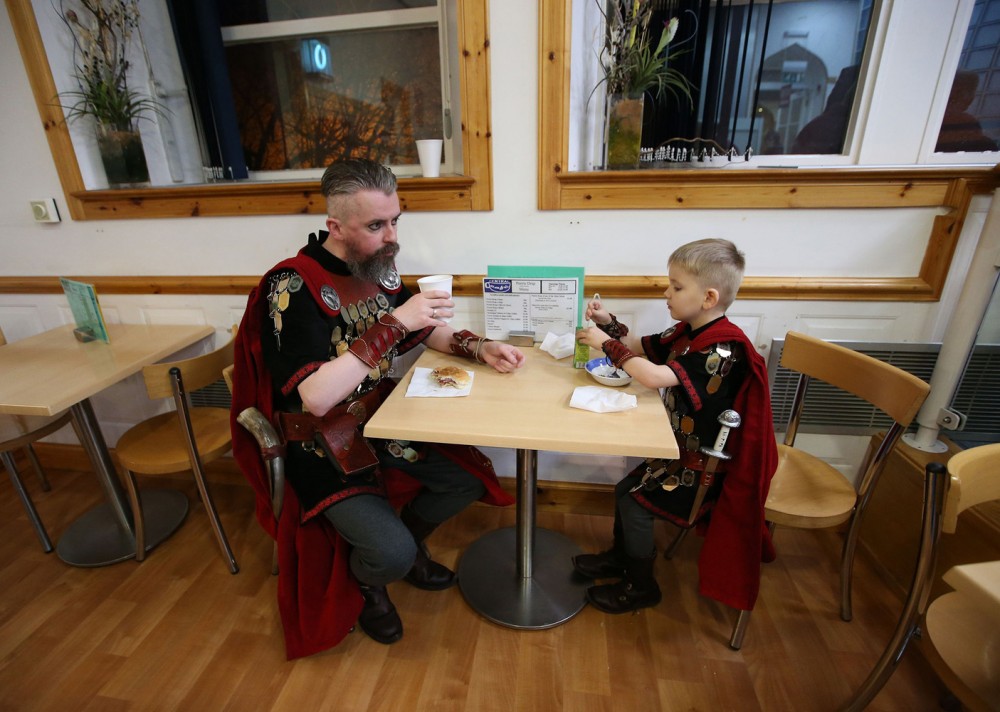 Up Helly Aa festival 2016. Members of the Jarl Squad dressed in Viking costumes have breakfast at Isleburgh Community Centre in Lerwick on the Shetland Isles during the Up Helly Aa Viking festival 2016. Picture date: Tuesday January 26, 2016. Originating in the 1880s, the festival celebrates Shetland's Norse heritage. Photo credit should read: Andrew Milligan/PA Wire URN:25343270
