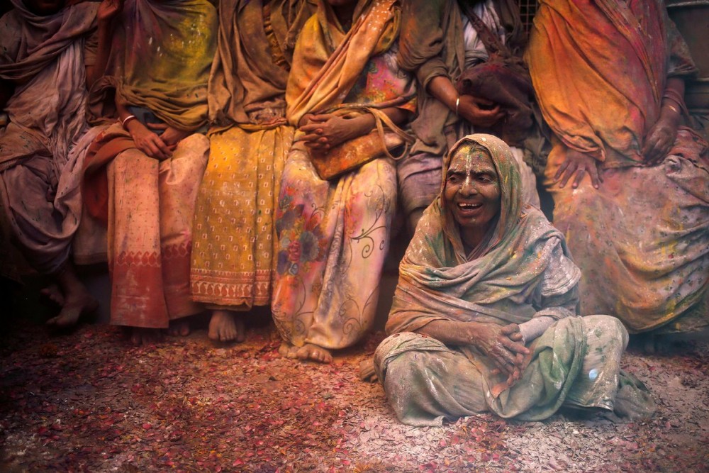 (Widows celebrate Holi in Vrindavan, UP. Image by Anindito Mukherjee/Reuters)