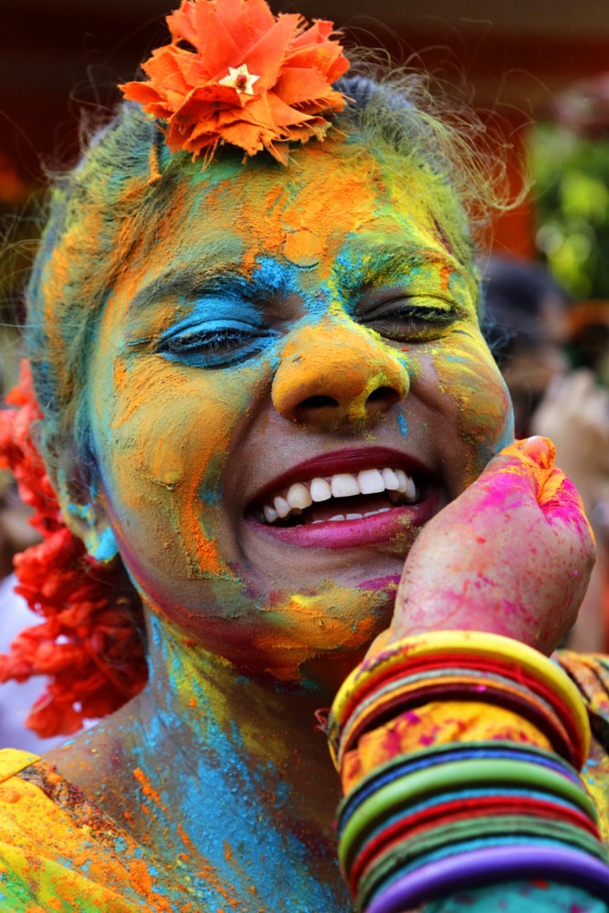 Indian Hindus celebrate the festival of colors or Holi in Kolkata, India, Wednesday, March 23, 2016. The holiday, celebrated mainly in India and Nepal, marks the beginning of spring and the triumph of good over evil. (AP Photo/Bikas Das)